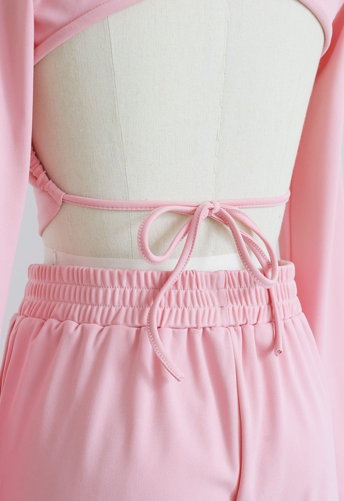 Conjunto de top corto con lazo en la espalda y shorts en rosa