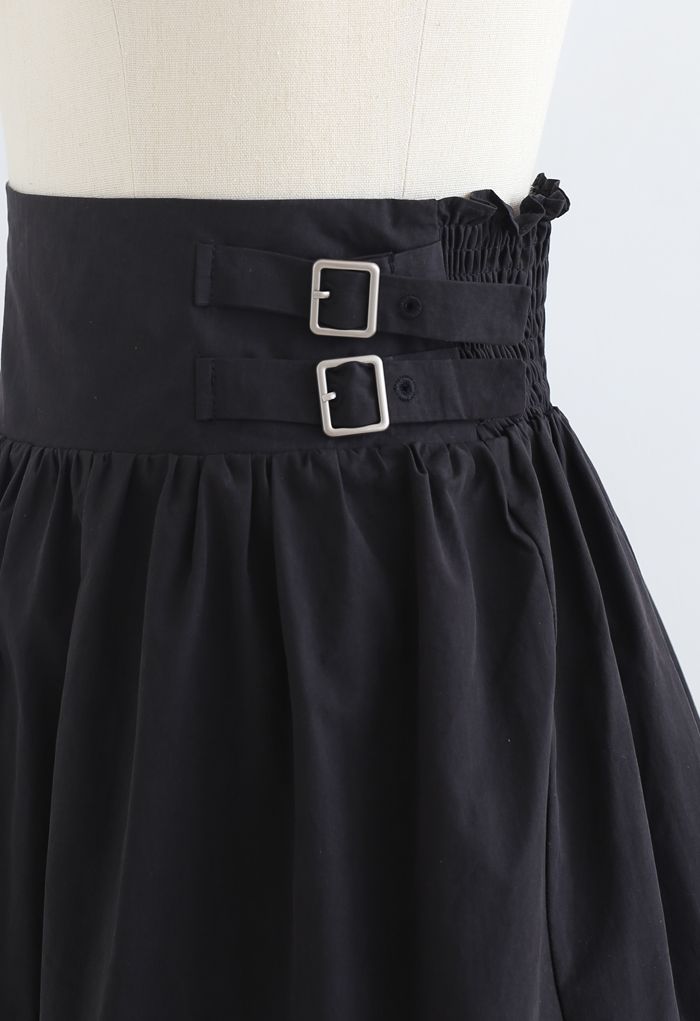 Minifalda plisada con doble cinturón en negro
