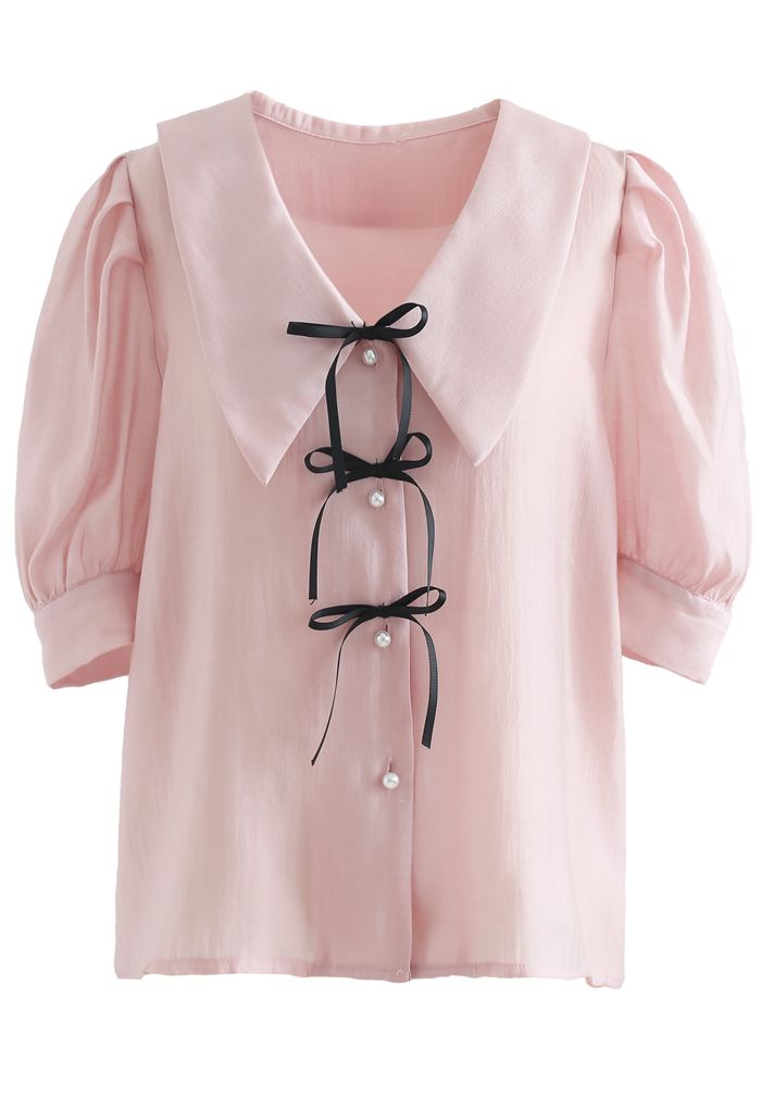 Camisa abotonada con cuello y lazo en rosa