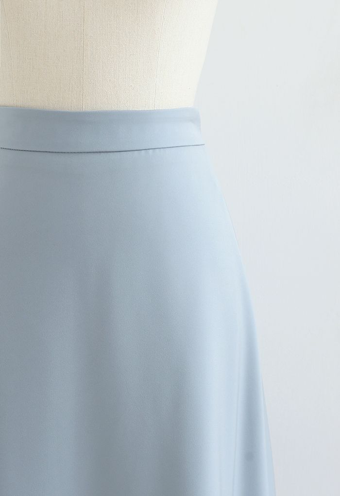 Falda básica midi evasé lisa en azul polvoriento