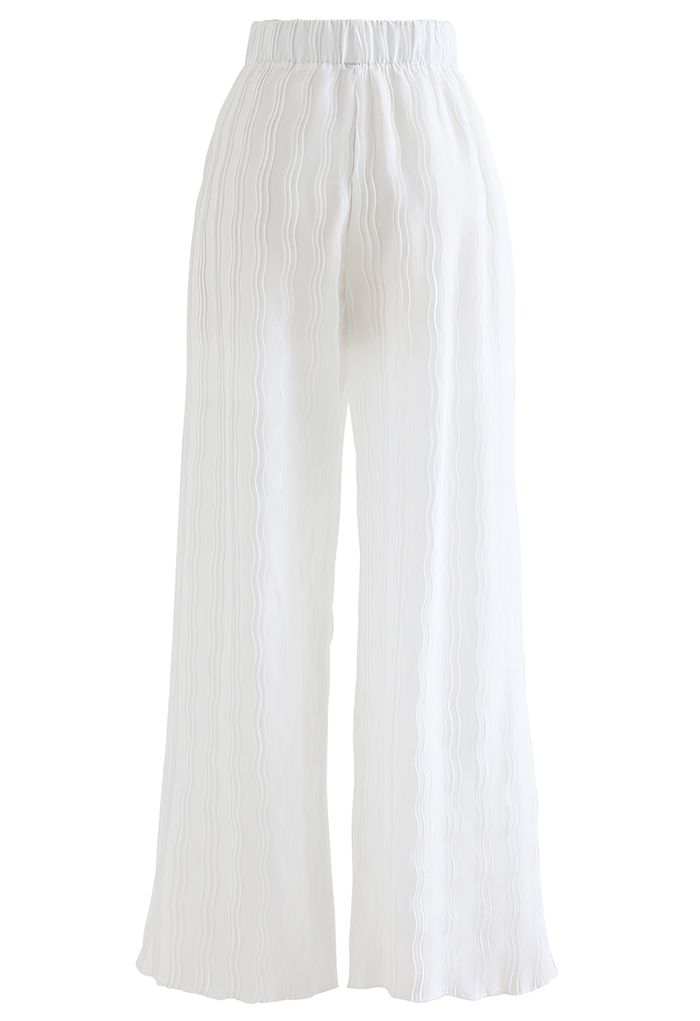 Pantalones de pernera ancha plisados ondulados en blanco