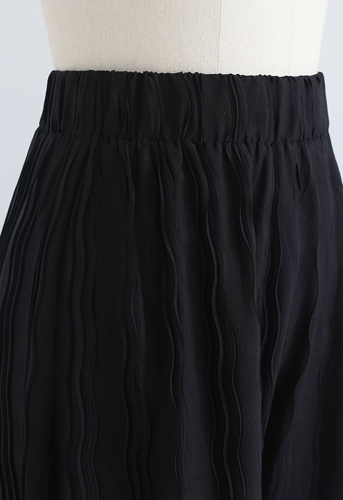 Pantalones de pernera ancha plisados ondulados en negro