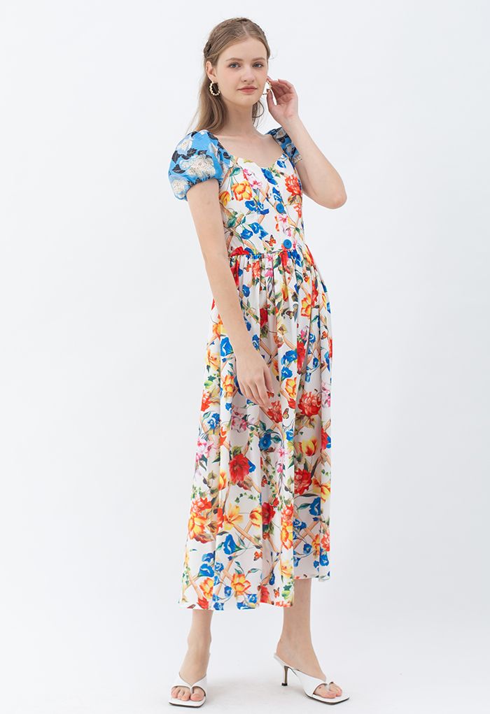 Vestido largo con manga jacquard y estampado floral vibrante