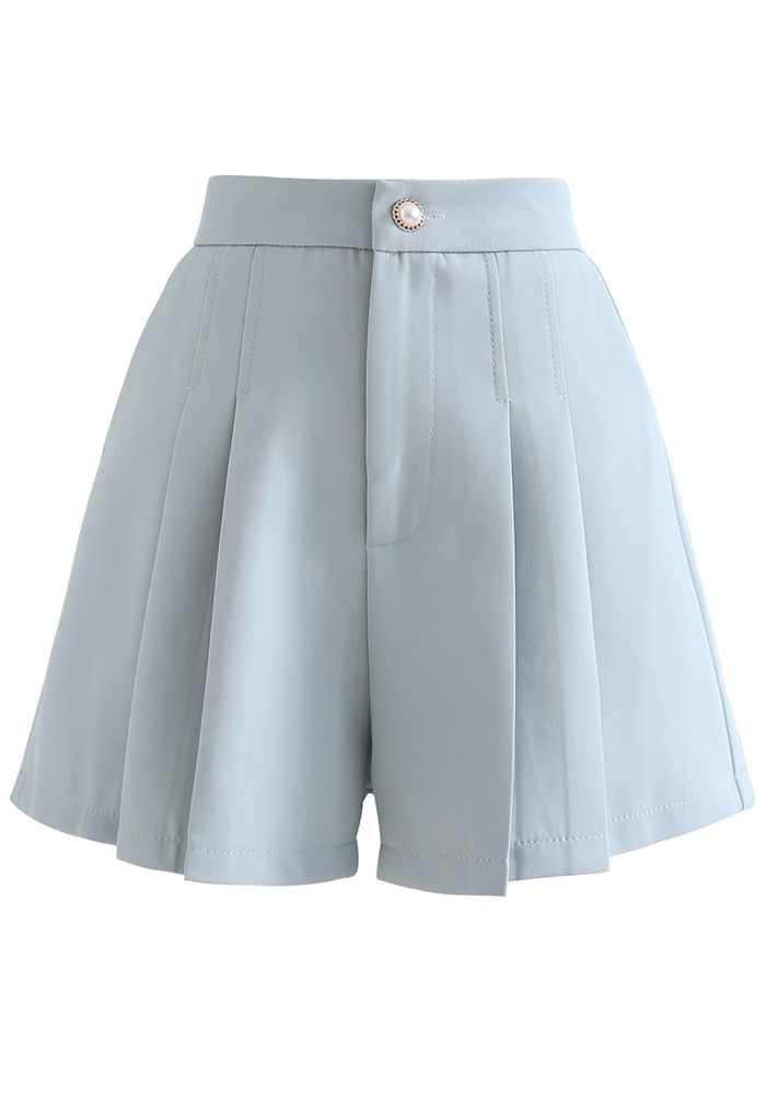 Shorts plisados con bolsillo lateral en azul