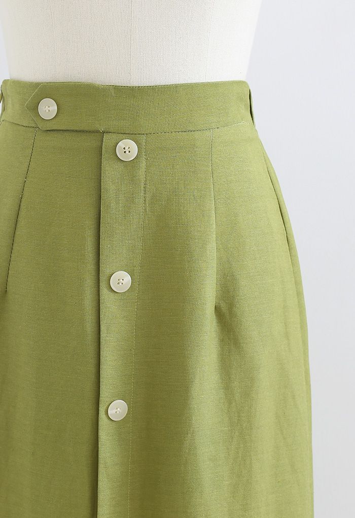 Falda midi adornada con botones y abertura delantera en verde musgo