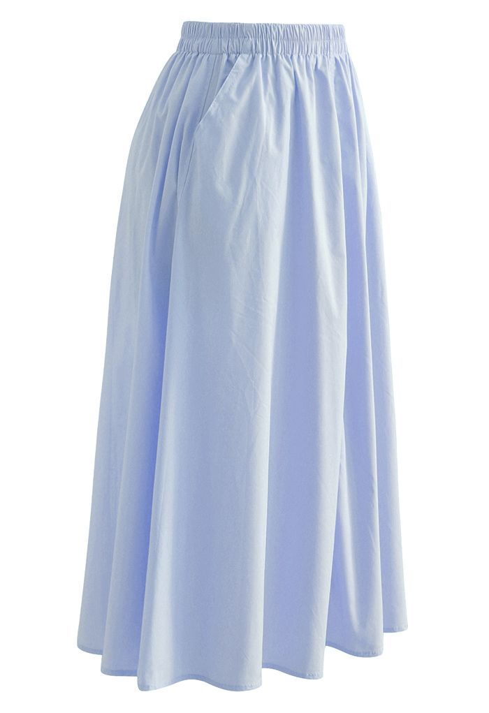 Falda de algodón con bolsillo lateral en color liso en azul