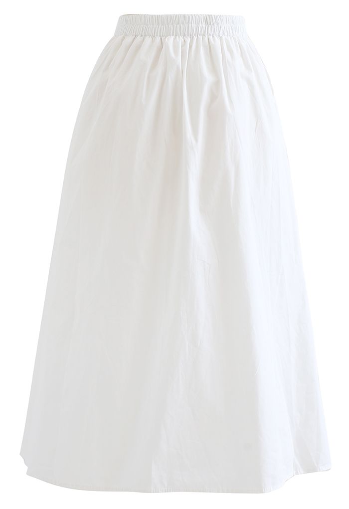 Falda de algodón con bolsillo lateral en color liso en blanco