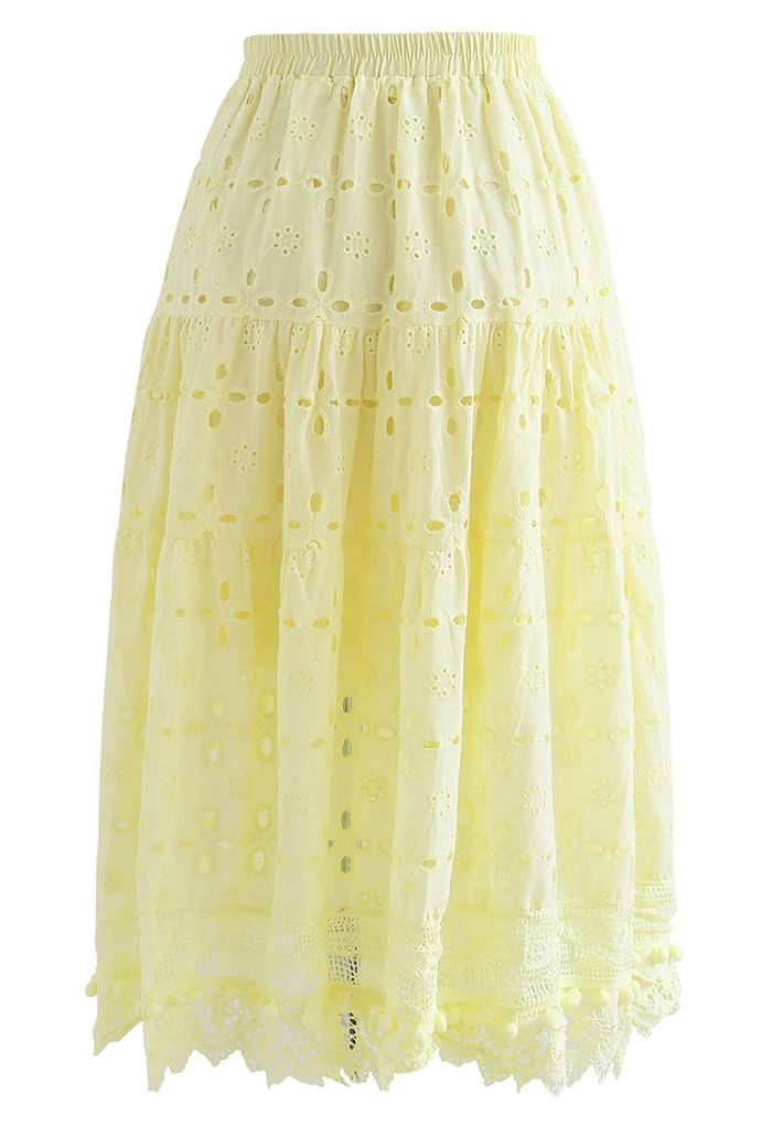 Falda midi de algodón bordado con pompones en amarillo