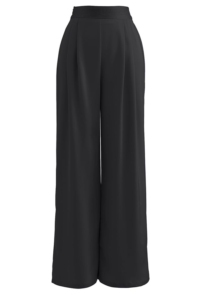 Pantalones de pierna ancha con pliegues brillantes en negro