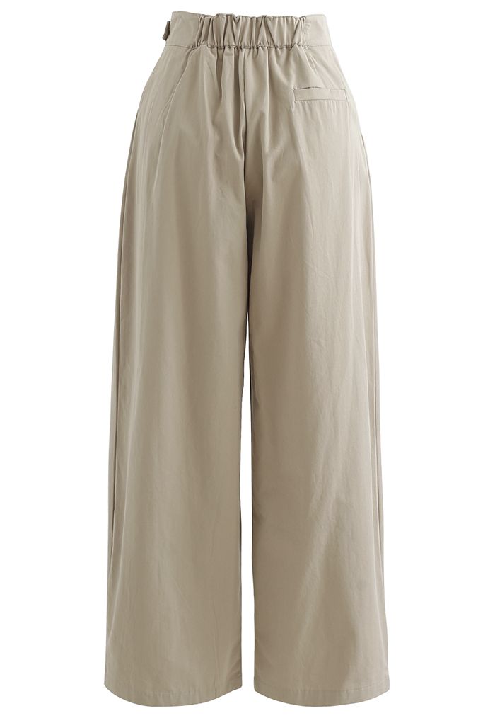 Pantalones de algodón con pierna recta y cintura con cinturón en tostado