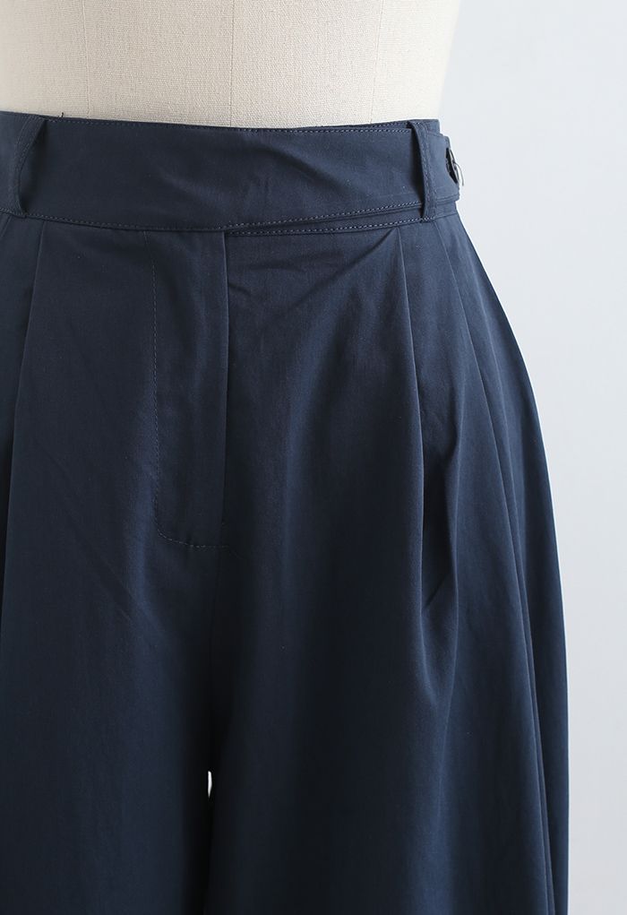 Pantalones de algodón de pierna recta con cinturón en azul marino