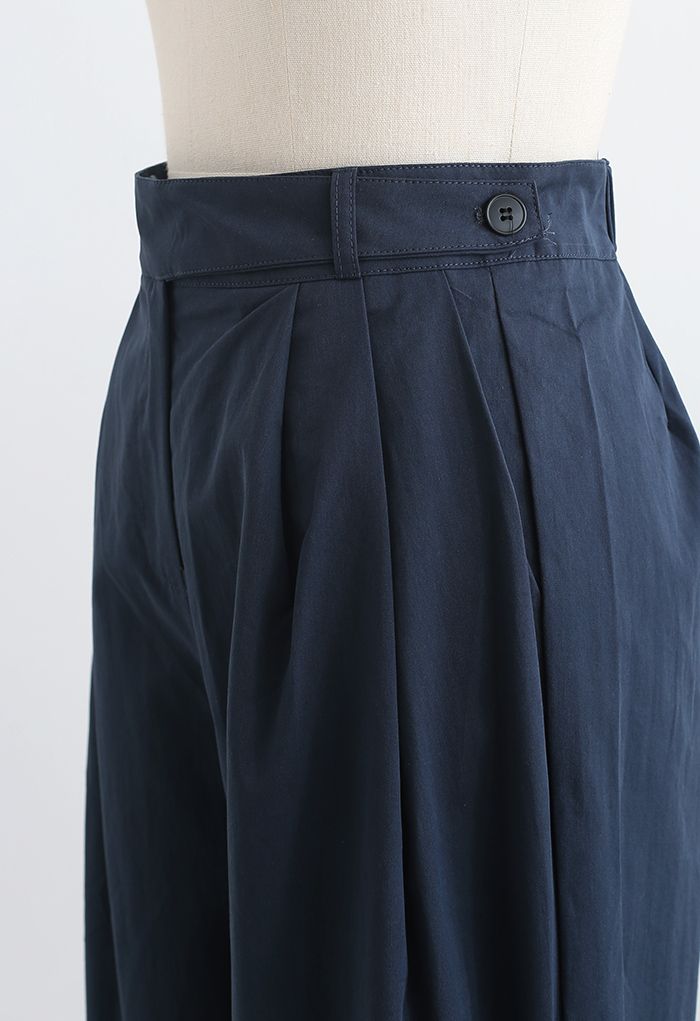 Pantalones de algodón de pierna recta con cinturón en azul marino