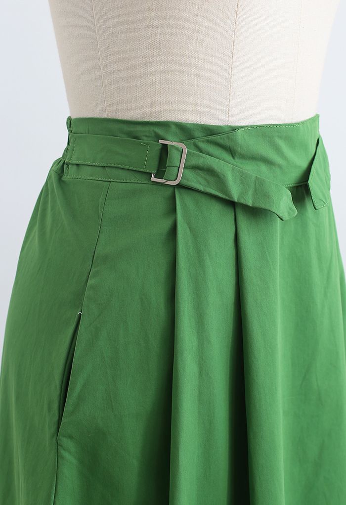 Falda midi de algodón plisada con cinturón en verde