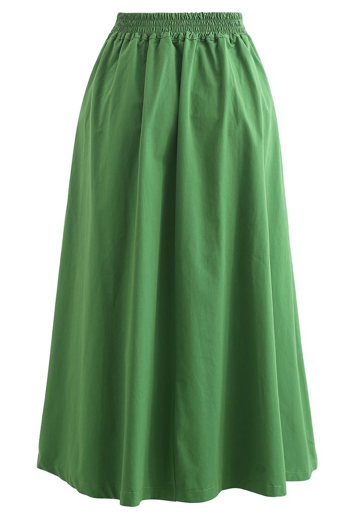 Falda midi de algodón plisada con cinturón en verde