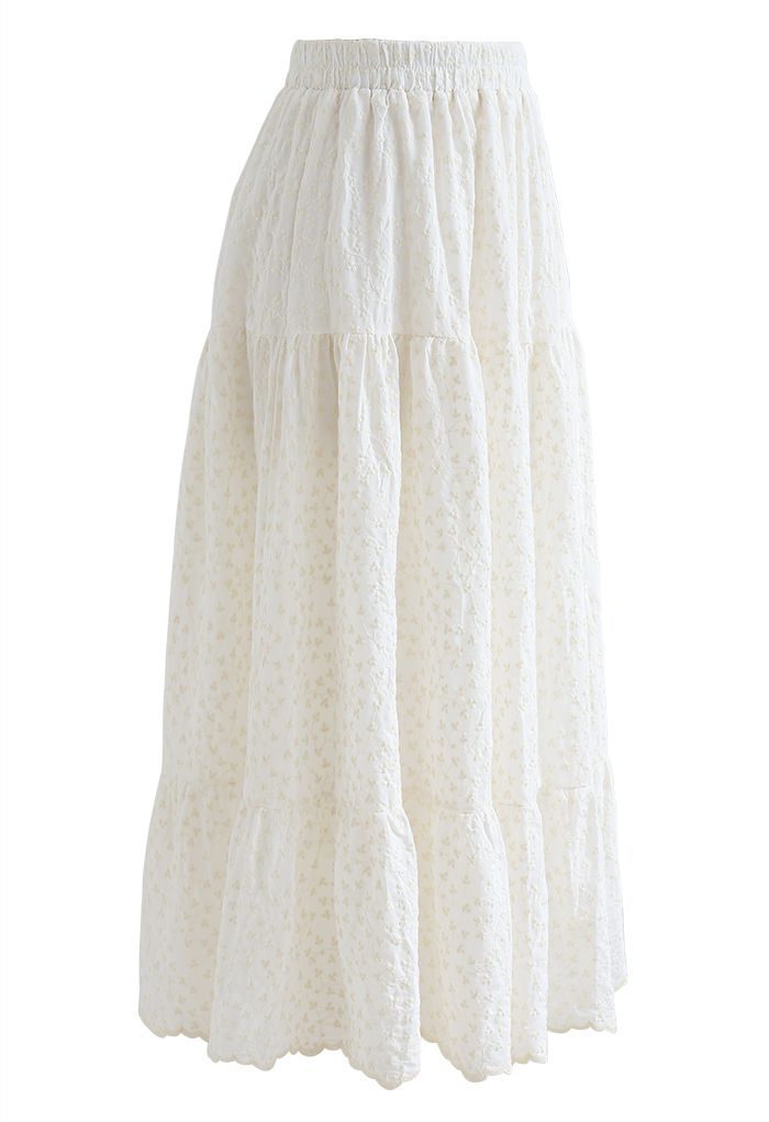 Falda de algodón con volantes de flores bordadas en color crema