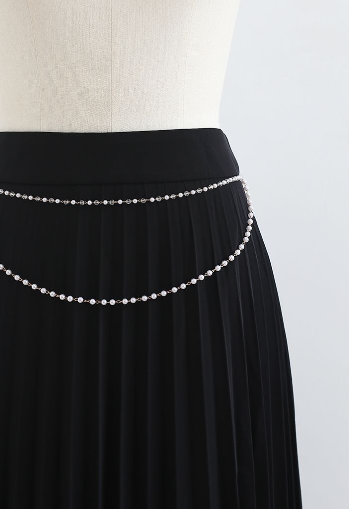 Falda midi plisada con cadena drapeada en negro