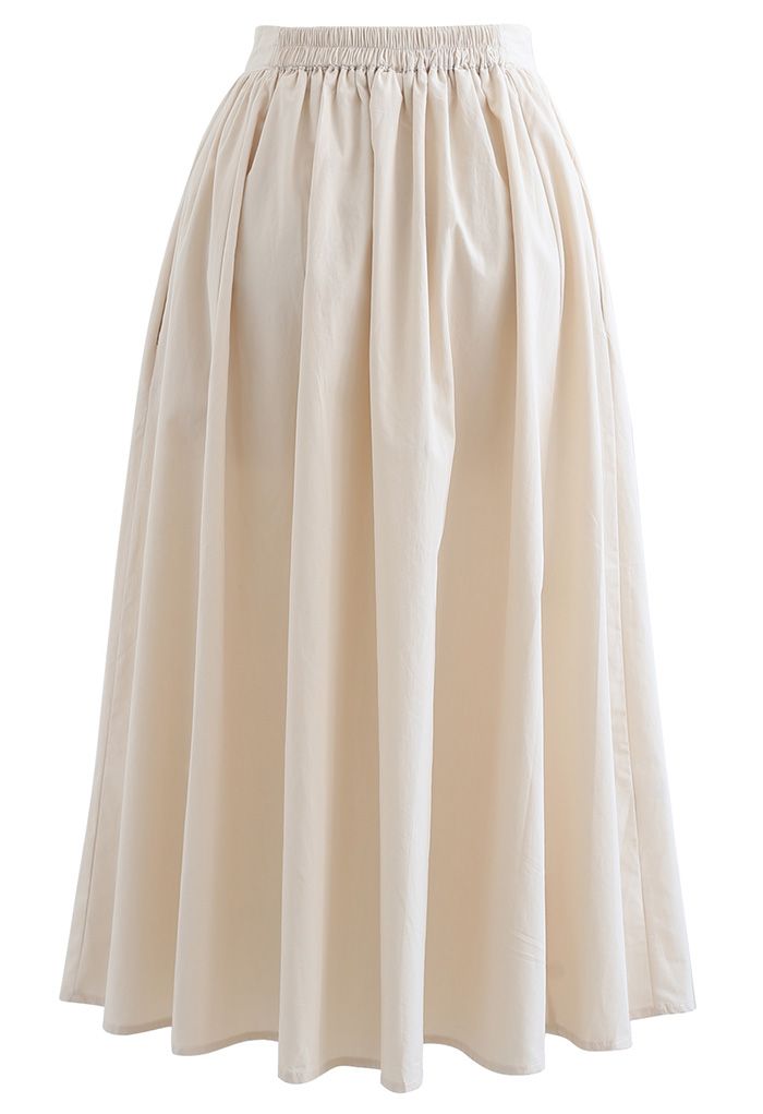 Falda midi versátil de algodón en color crema