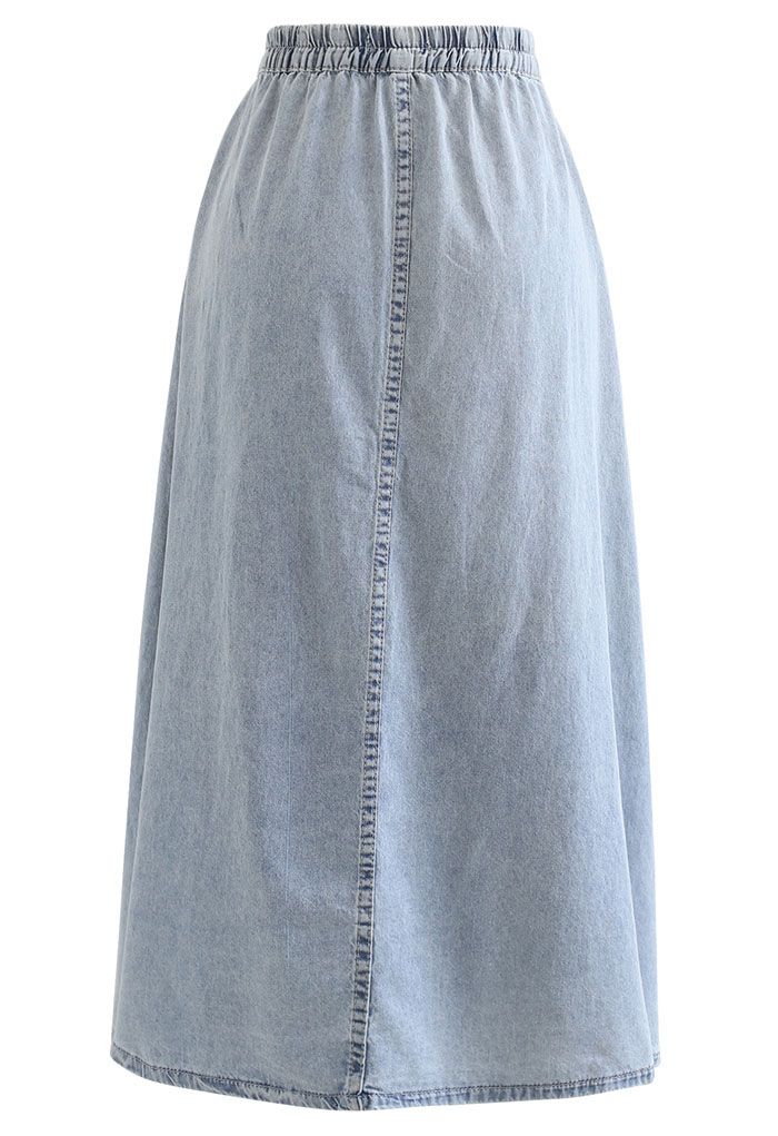 Falda de mezclilla acampanada con cintura elástica en azul lavado