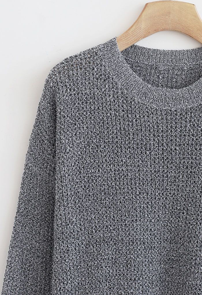 Suéter extragrande de punto calado en gris