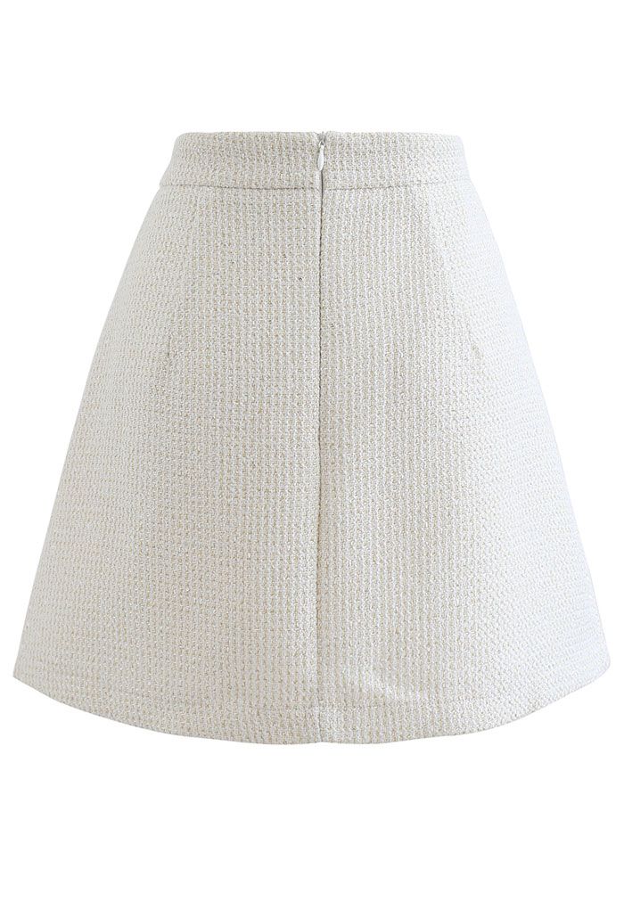 Minifalda de tweed plisada metalizada brillante en crema