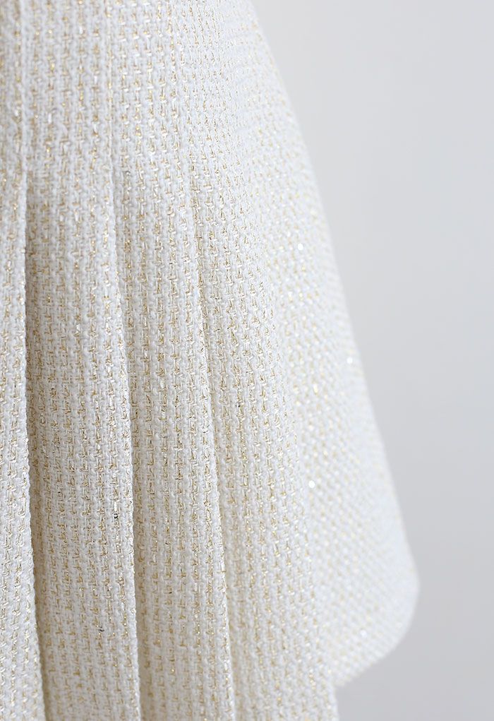 Minifalda de tweed plisada metalizada brillante en crema