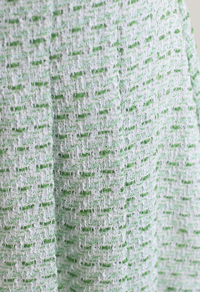 Minifalda de tweed con dobladillo plisado en la parte delantera verde
