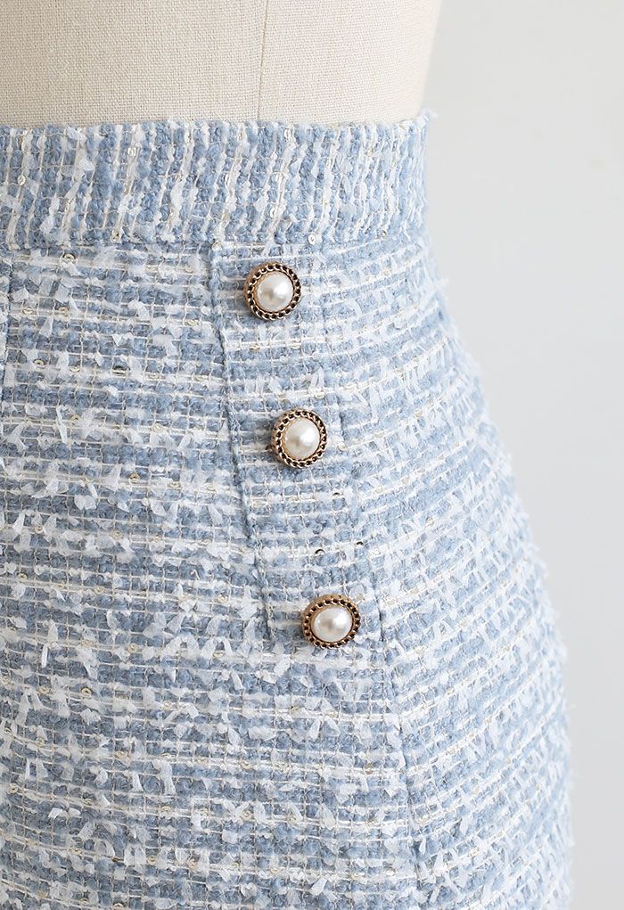 Minifalda de tweed con lentejuelas y ribete de botones en azul