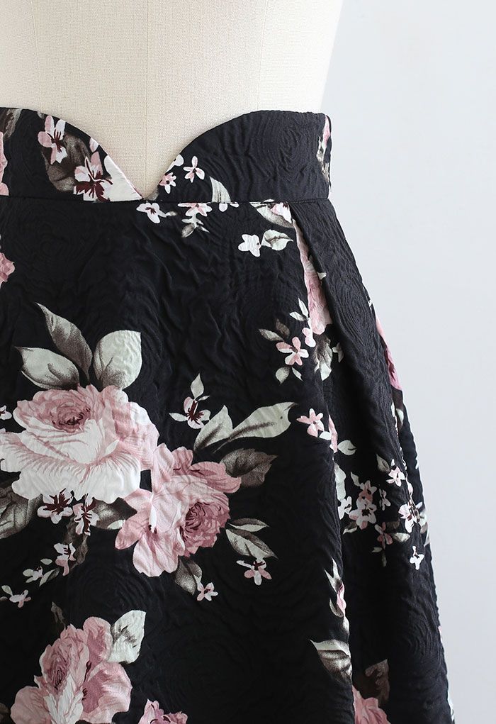 Falda midi plisada floral en relieve en negro