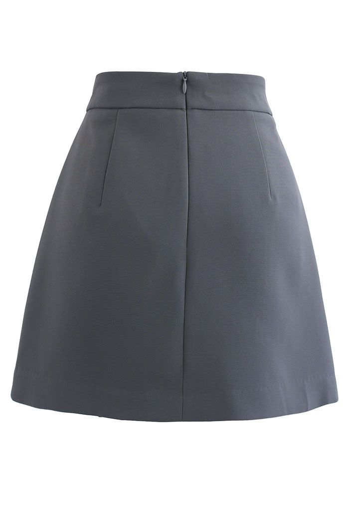 Minifalda con doble solapa y botones en gris