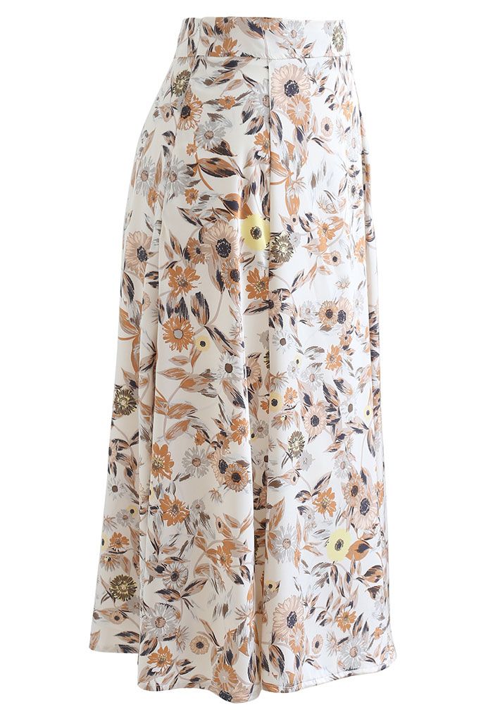 Falda midi de satén con estampado de margaritas en color crema