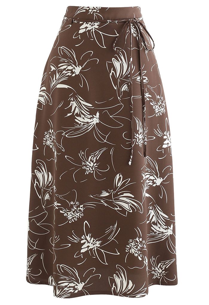 Falda a media pierna con estampado de bocetos de flores en marrón