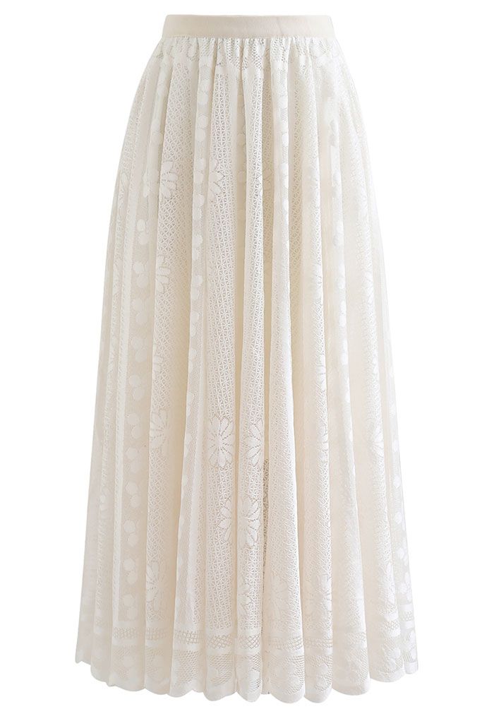 Falda larga con bajo festoneado y encaje floral en color crema