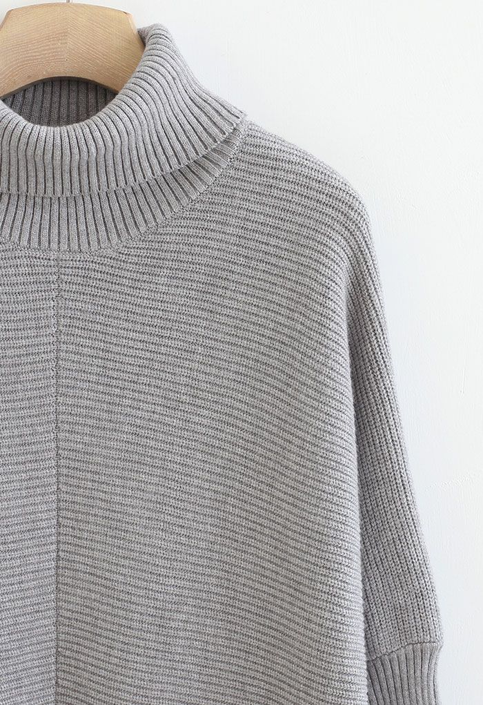 Suéter de cuello alto sin esfuerzo elegante con manga de murciélago en gris