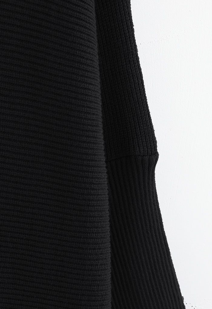 Suéter Hi-Lo con manga de murciélago y cuello alto elegante sin esfuerzo en negro