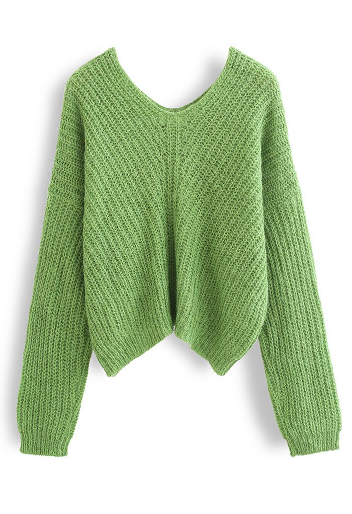 Suéter de punto ahuecado con cuello en V en verde