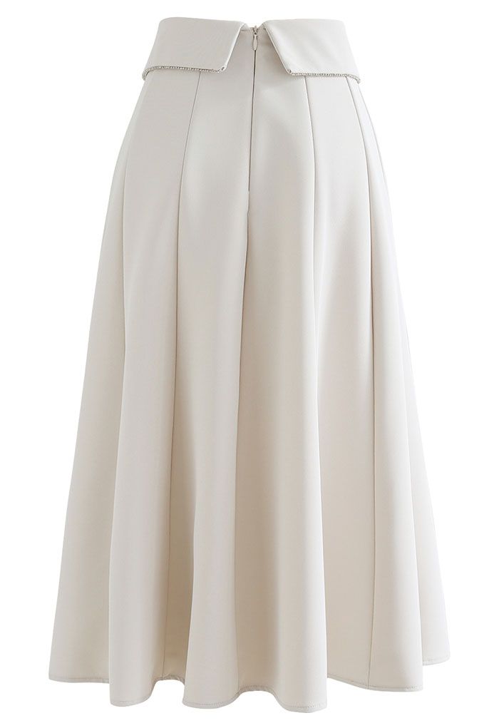 Falda midi con detalle de costuras con solapa de cristal en marfil