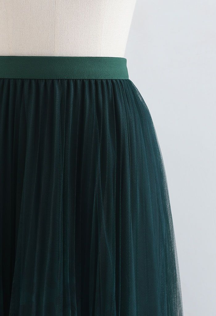 Falda plisada de malla degradada con estampado de puntos en verde oscuro