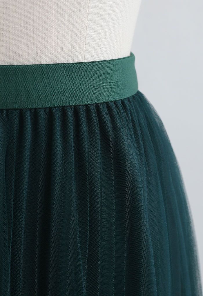 Falda plisada de malla degradada con estampado de puntos en verde oscuro