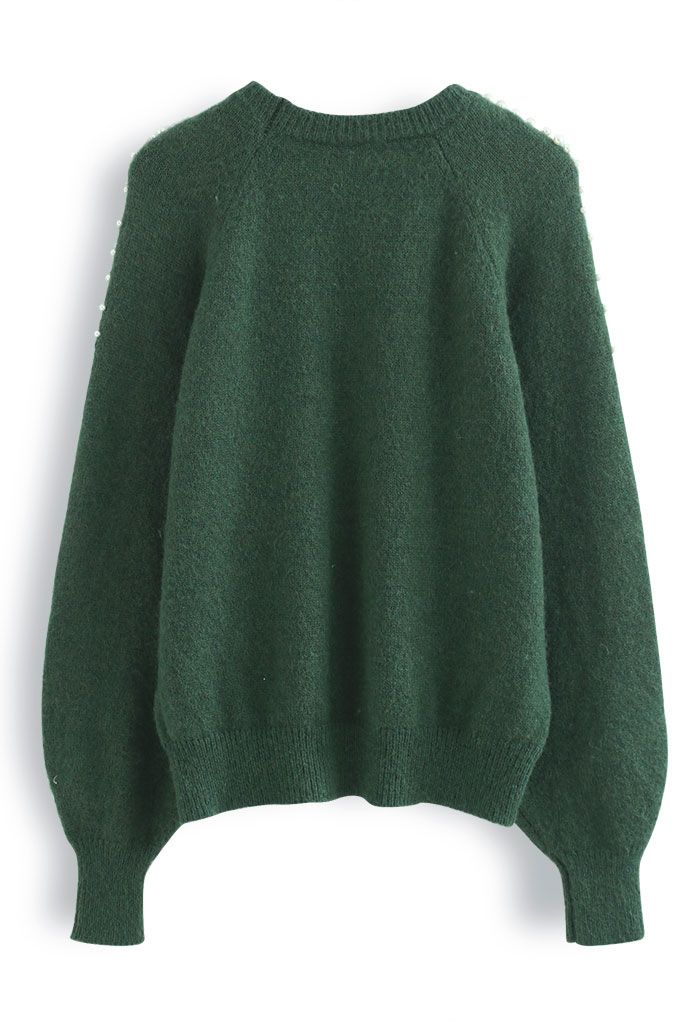 Suéter verde de punto difuso con hombros nacarados