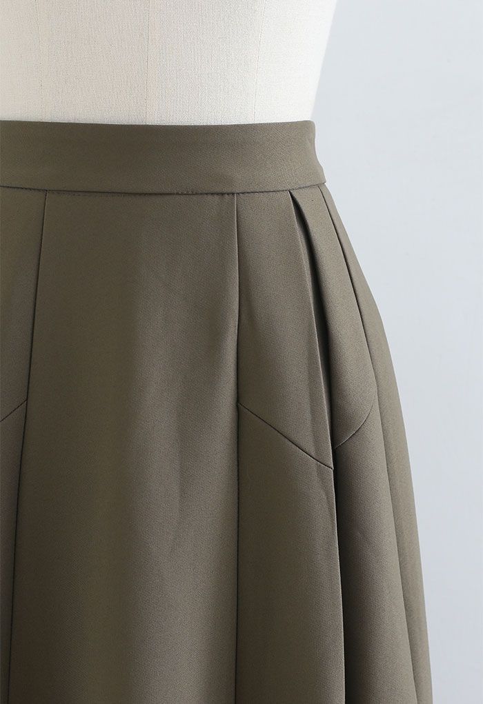 Falda midi plisada y funcional en color caqui