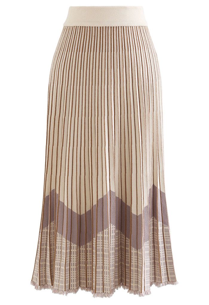 Falda midi color crema con pliegues en contraste y dobladillo con borlas