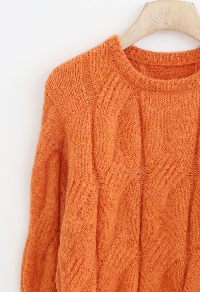 Suéter de punto trenzado con cuello redondo Fuzzy en naranja