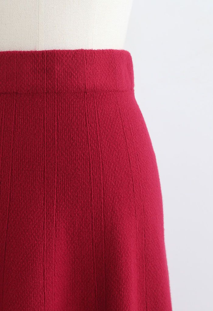 Falda midi de punto con dobladillo acampanado texturizado en rojo
