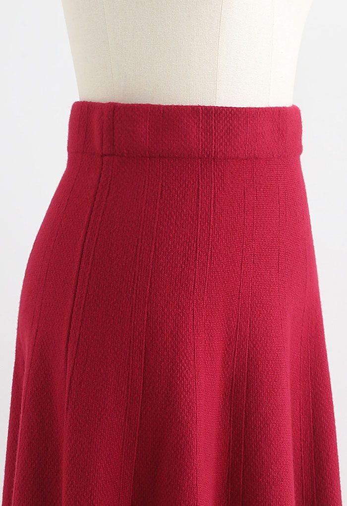 Falda midi de punto con dobladillo acampanado texturizado en rojo