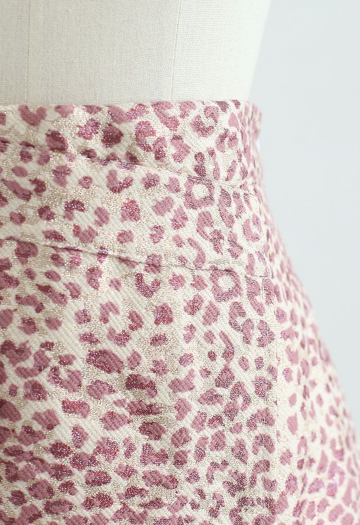 Minifalda asimétrica de leopardo brillante en rosa