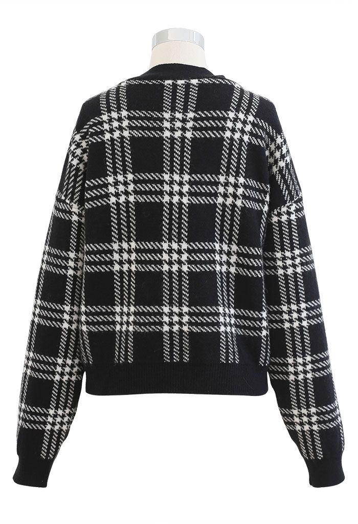 Suéter de punto cruzado con lazo y estampado de cuadros en negro