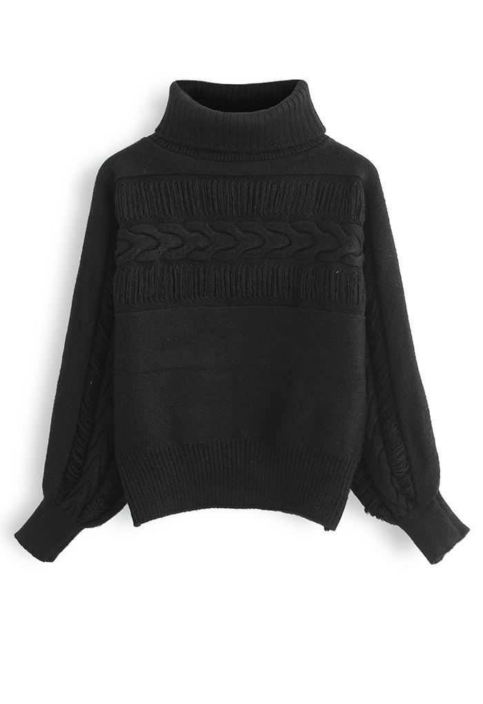 Suéter de punto con cuello alto y detalles de flecos en negro