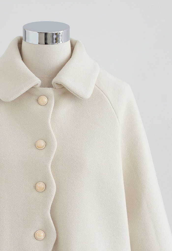 Abrigo largo de mezcla de lana con botones y borde festoneado en marfil