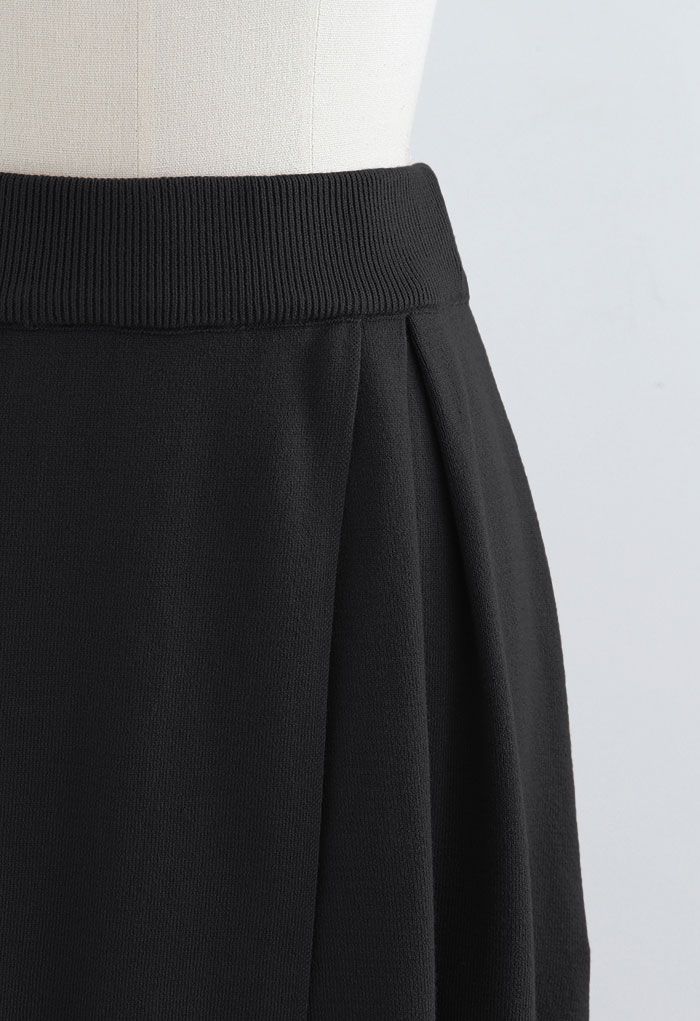 Falda de punto con solapa de todo fósforo en negro