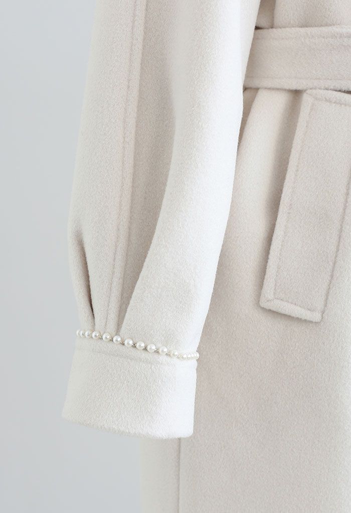 Abrigo largo de mezcla de lana con botones y borde perlado en crema